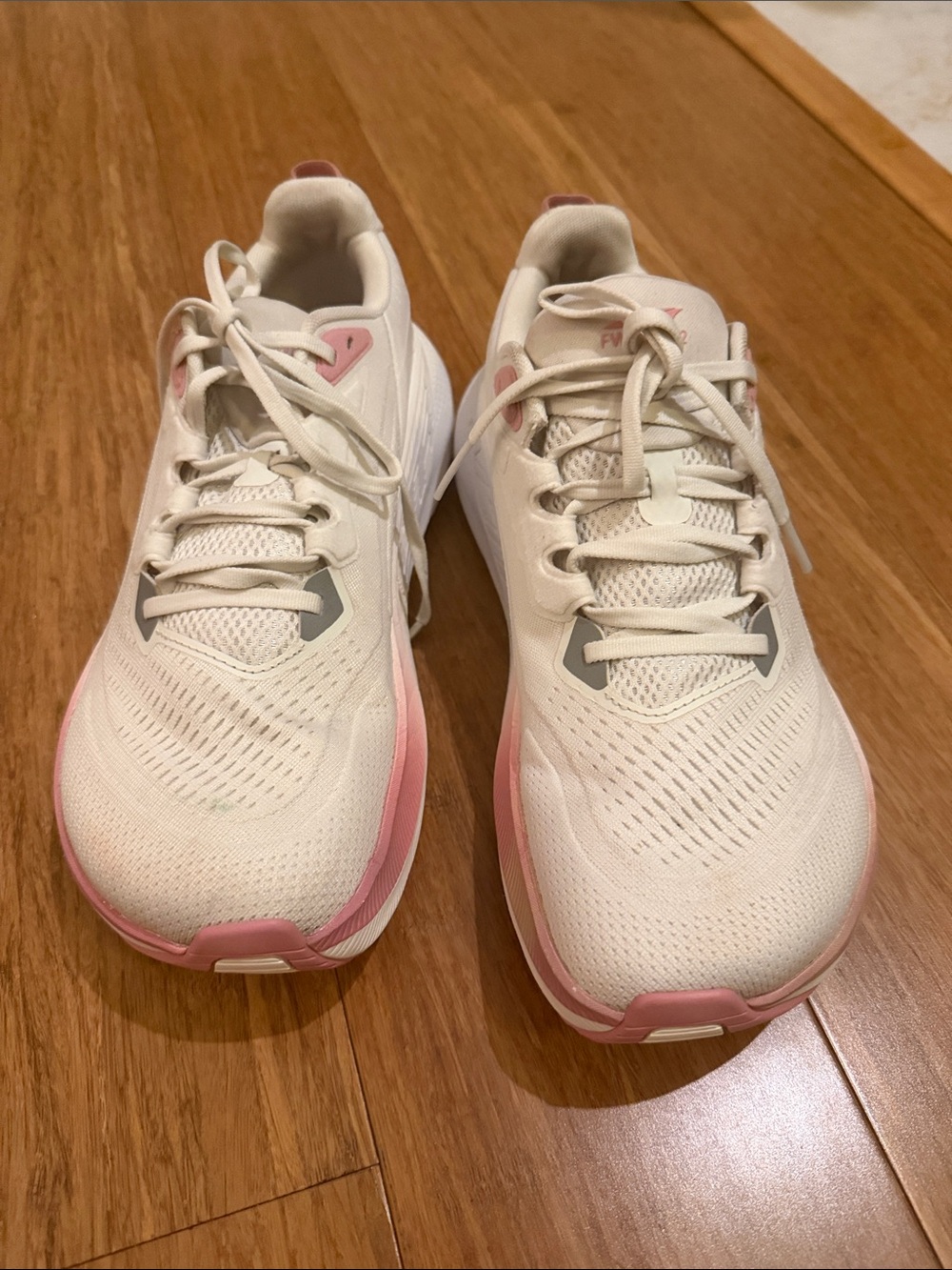 Altra Women’s Via Forward 2 grey and pink running shoes.